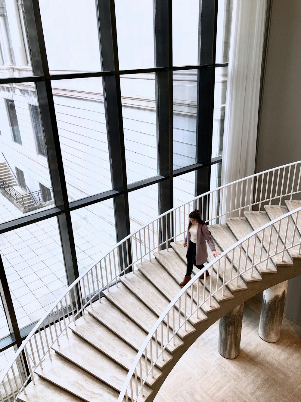 woman walking down stairs