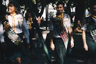 Smiling scouts proudly displaying badges earned from various activities.