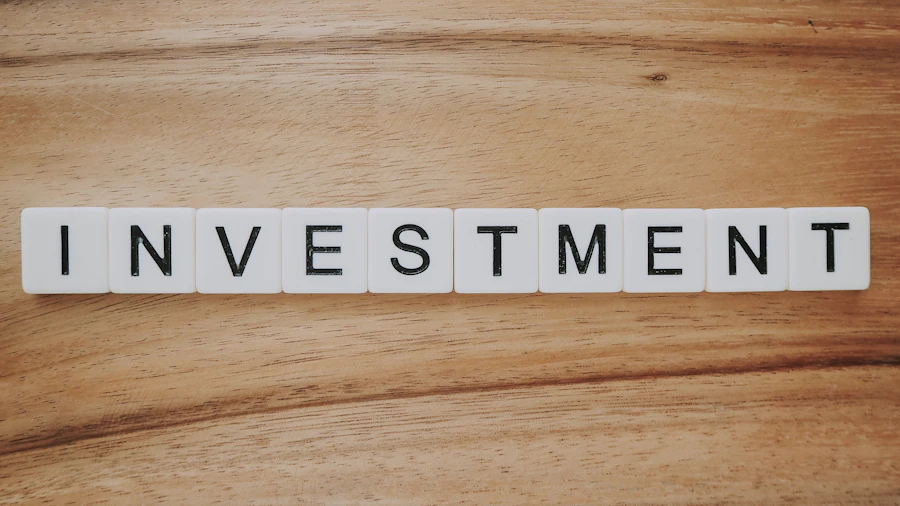 Wooden letter blocks spelling investment