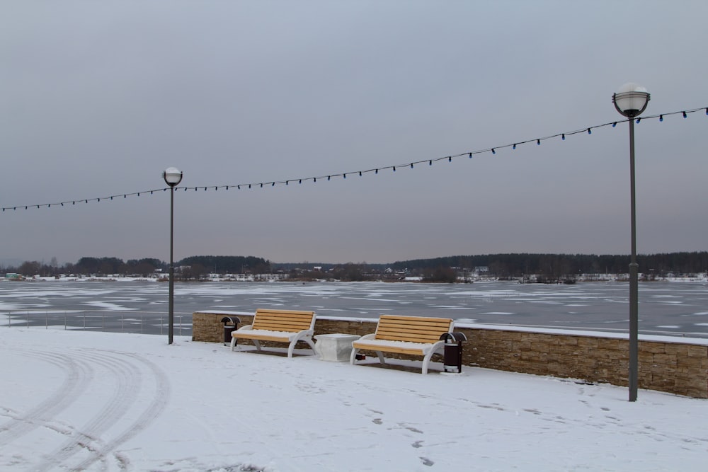 two brown-and-white wooden benches