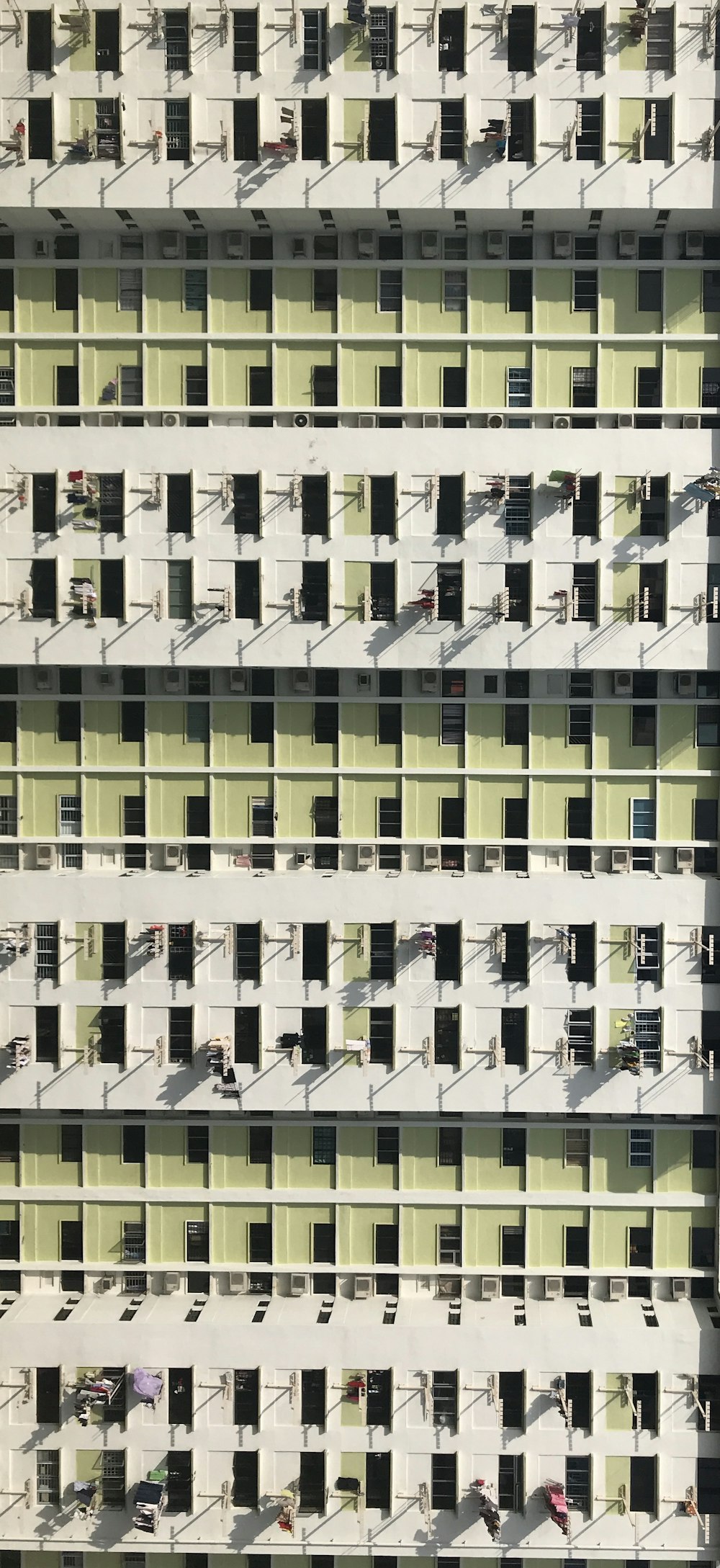 minimalist photography of high-rise building window