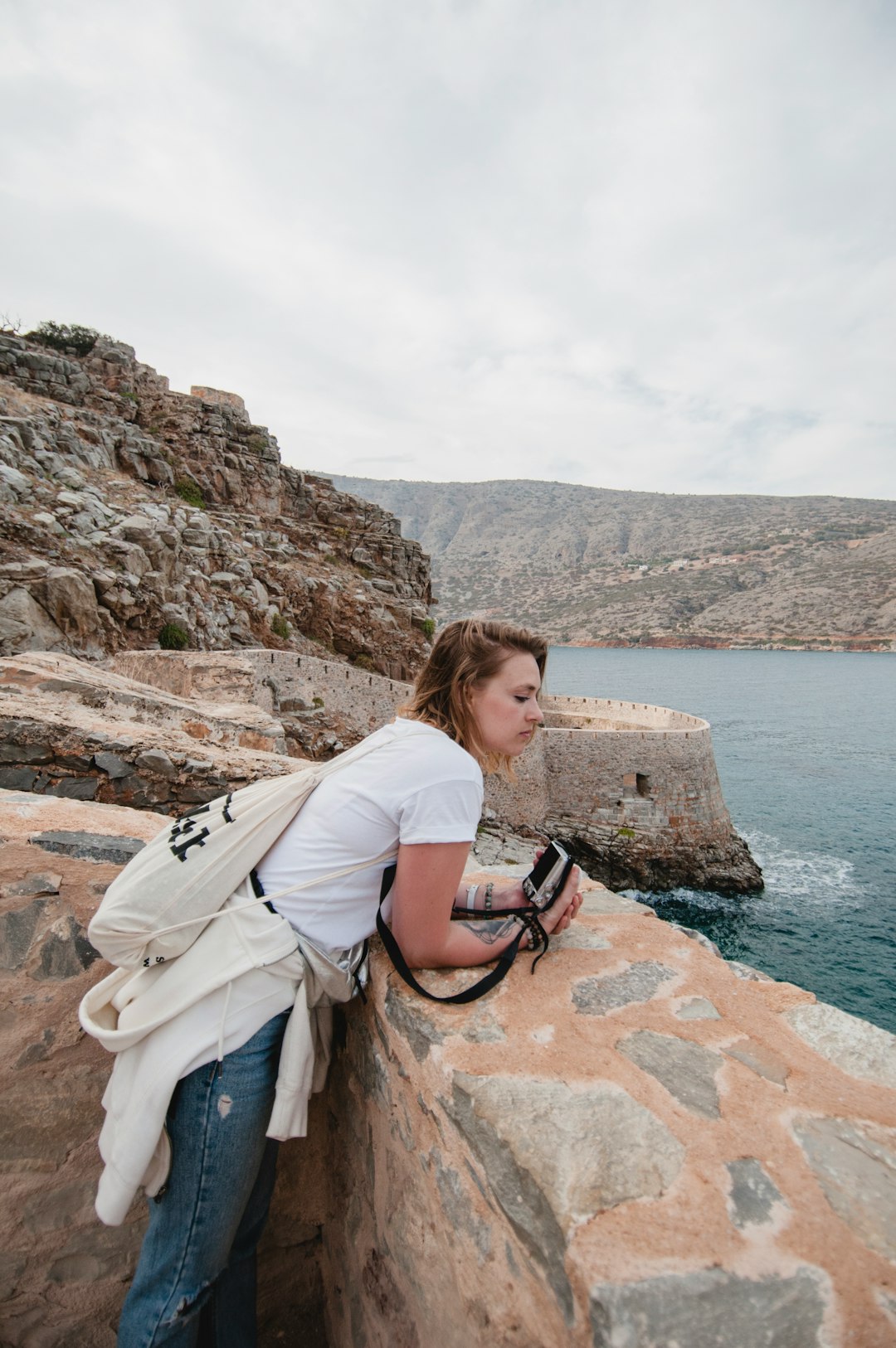 woman watching sea during daytime