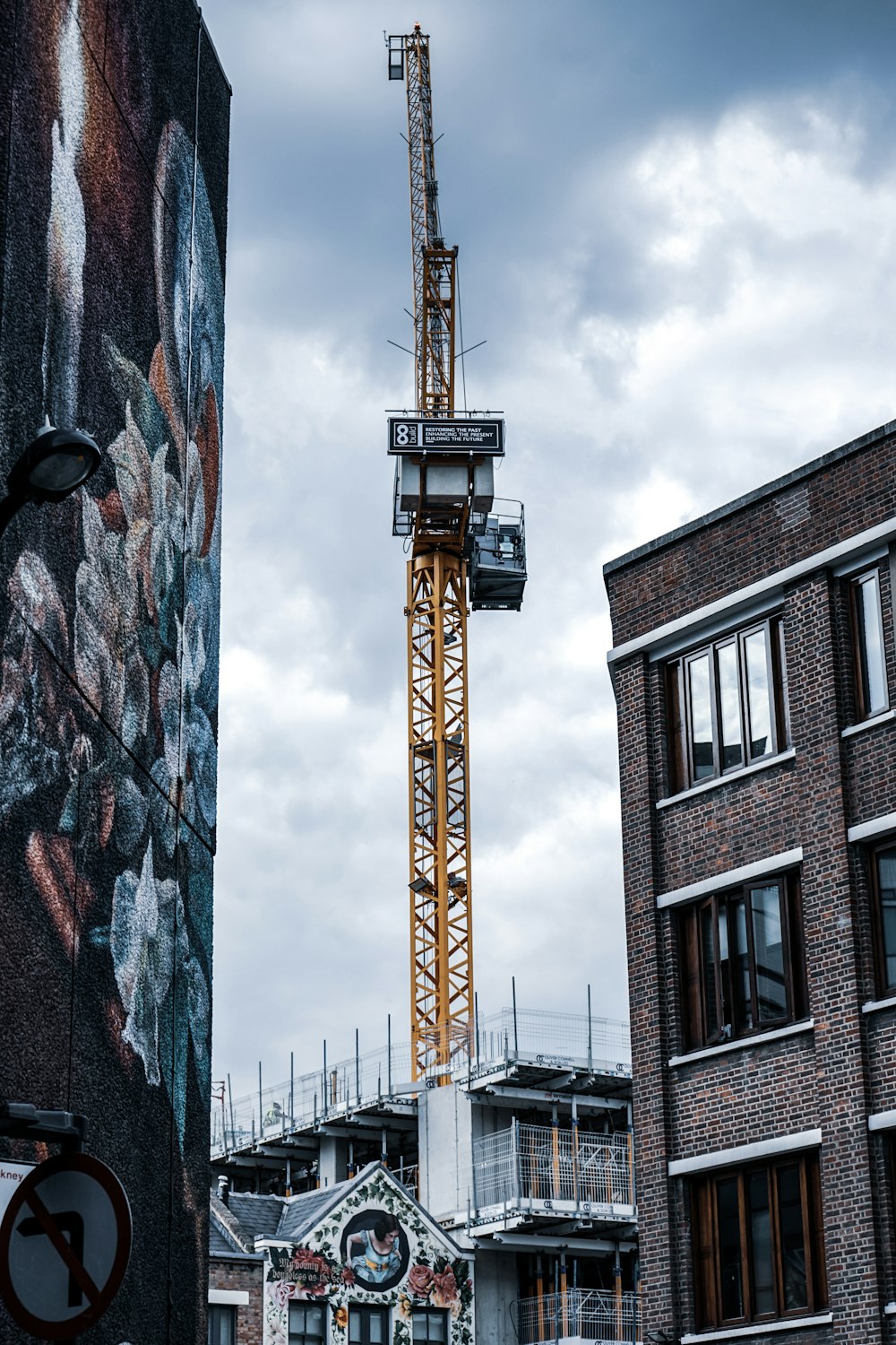 black elevator on yellow tower building