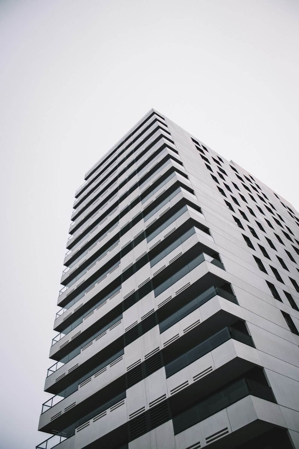 low-angle photography of gray building