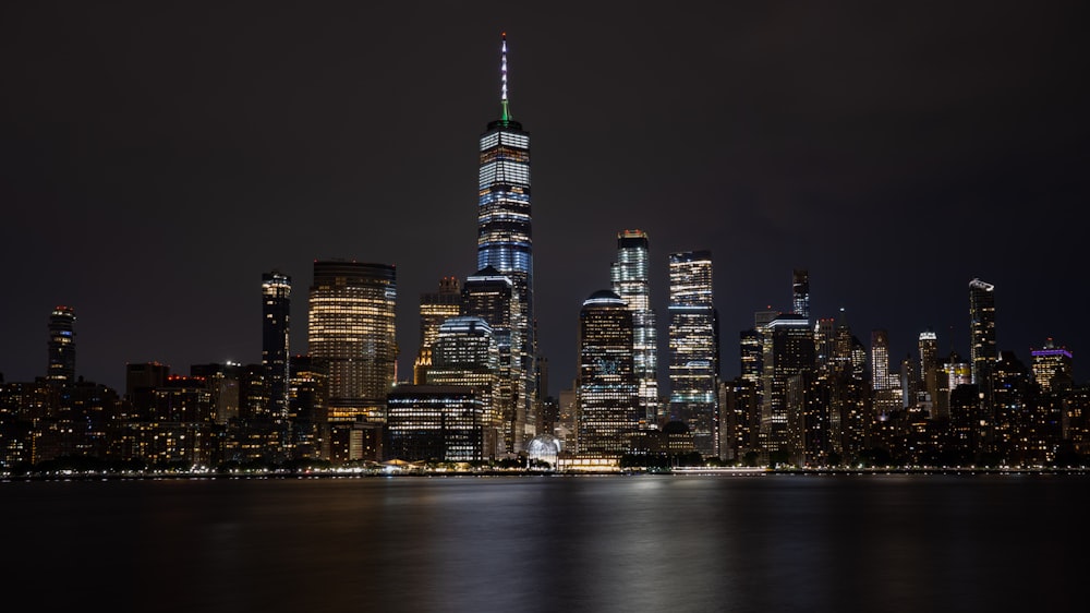 city with high-rise buildings during night time