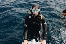 man wearing scuba diving suit