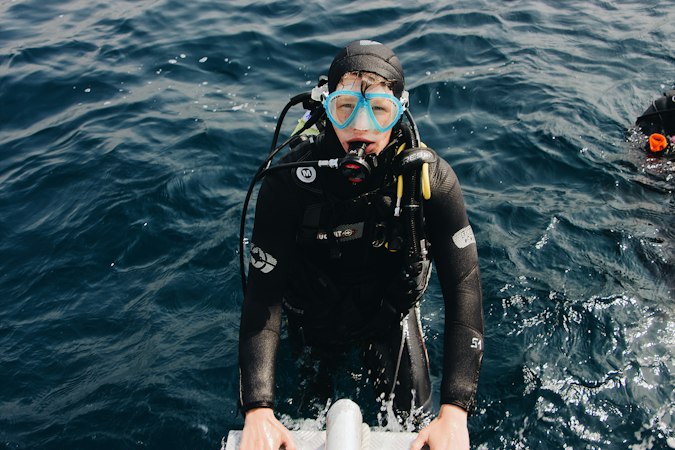 Man wearing scuba diving suit