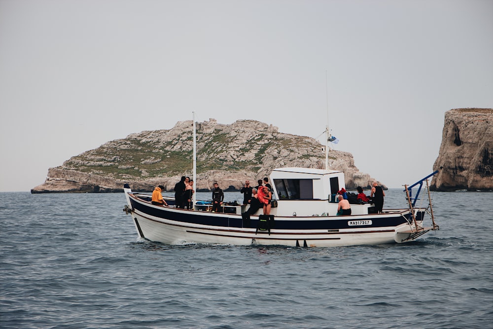 people riding in powerboat