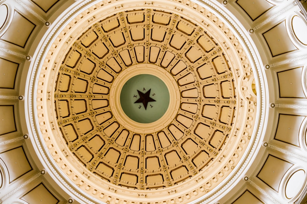 low-angle photography of building ceiling