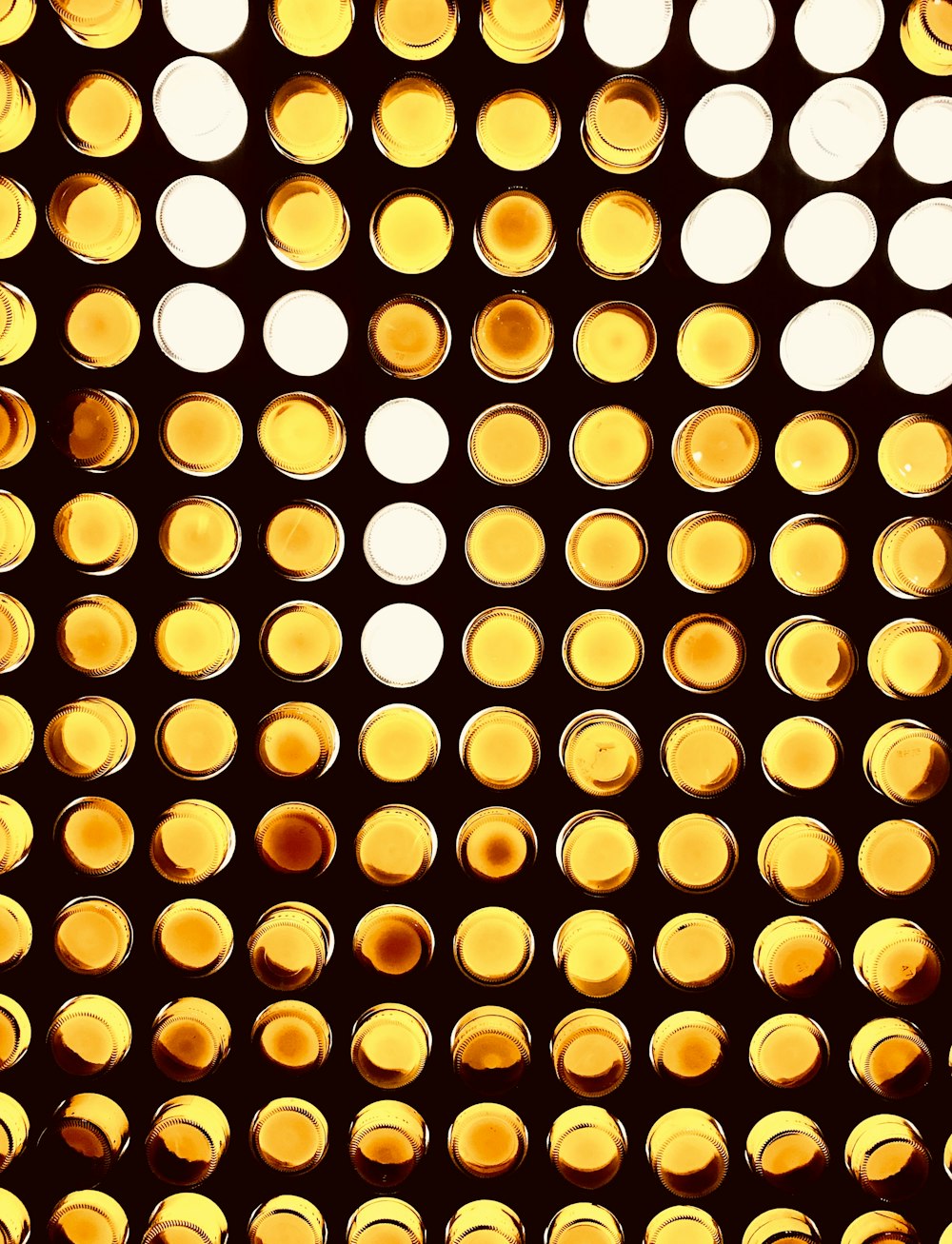 a bunch of lights that are on a wall