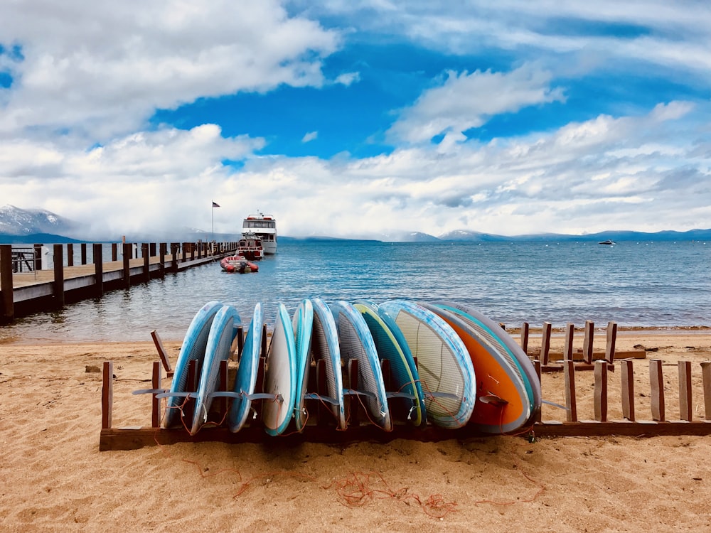 surfboards on rack at the beach