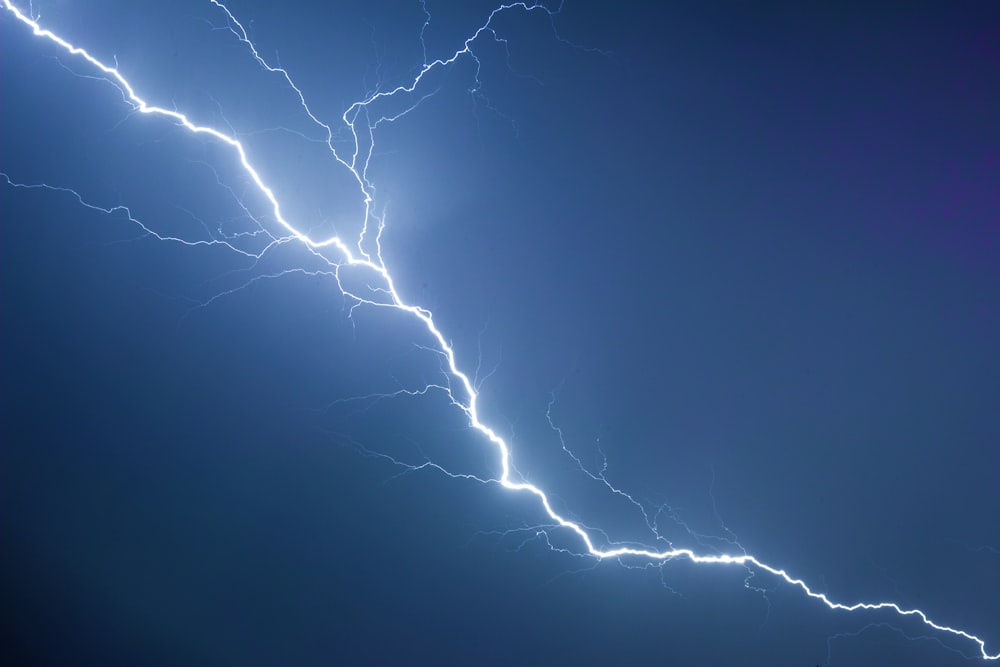 a lightning bolt is seen in the sky