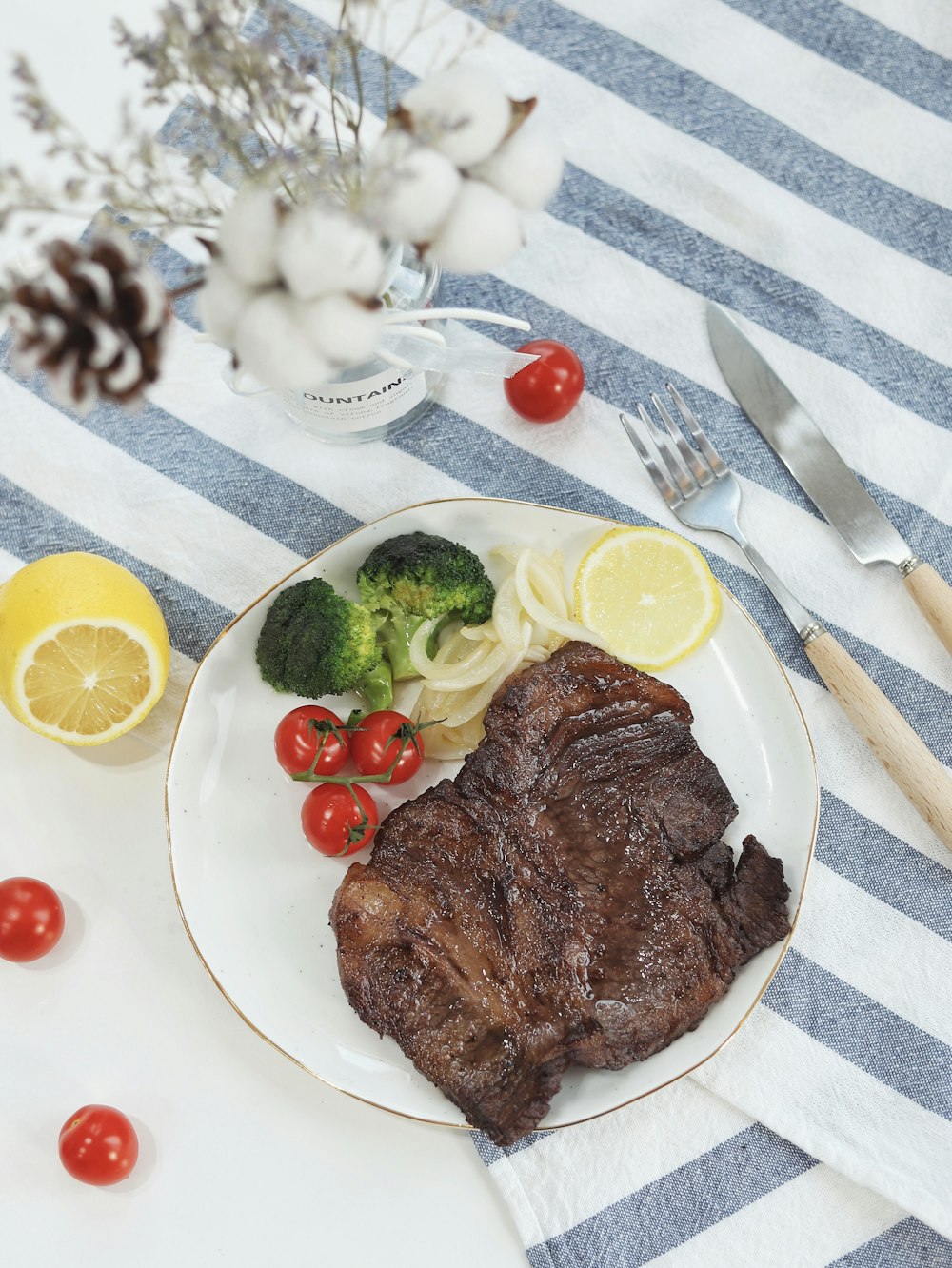 steak beside broccoli