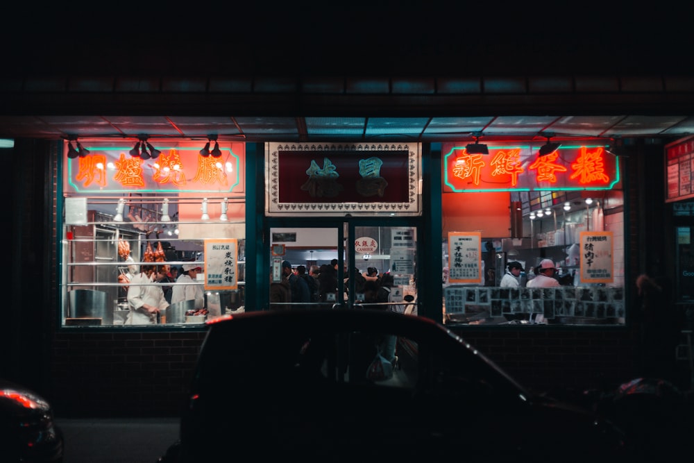 people in Chinese restaurant during nighttime