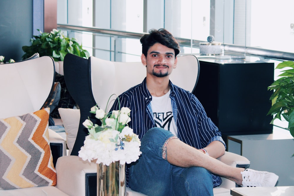 man sitting on chair