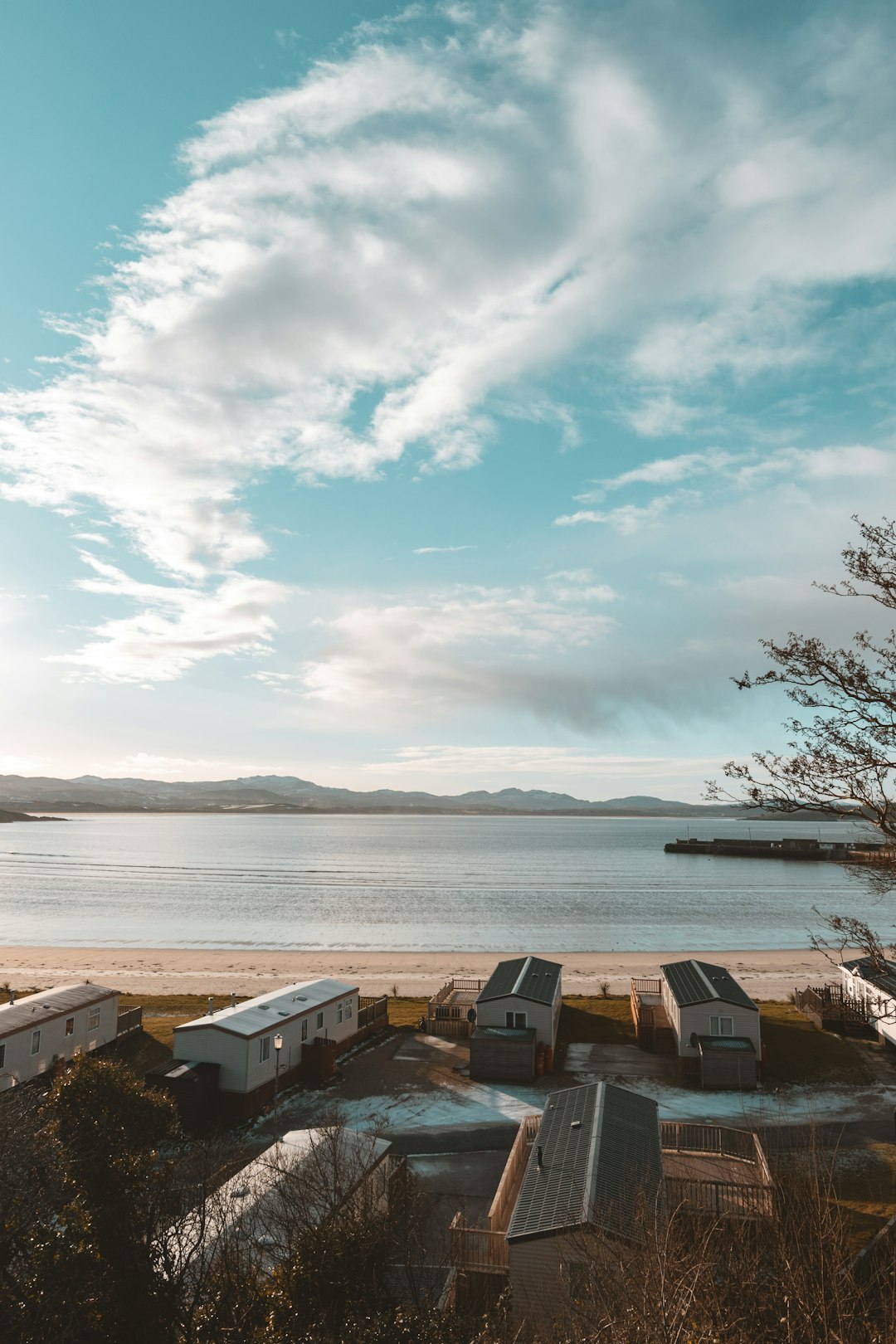 houses near body of water during daytime