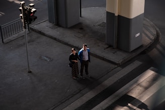 two people on intersection