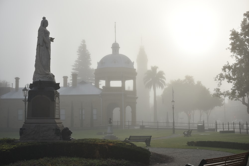 grey statue during daytime