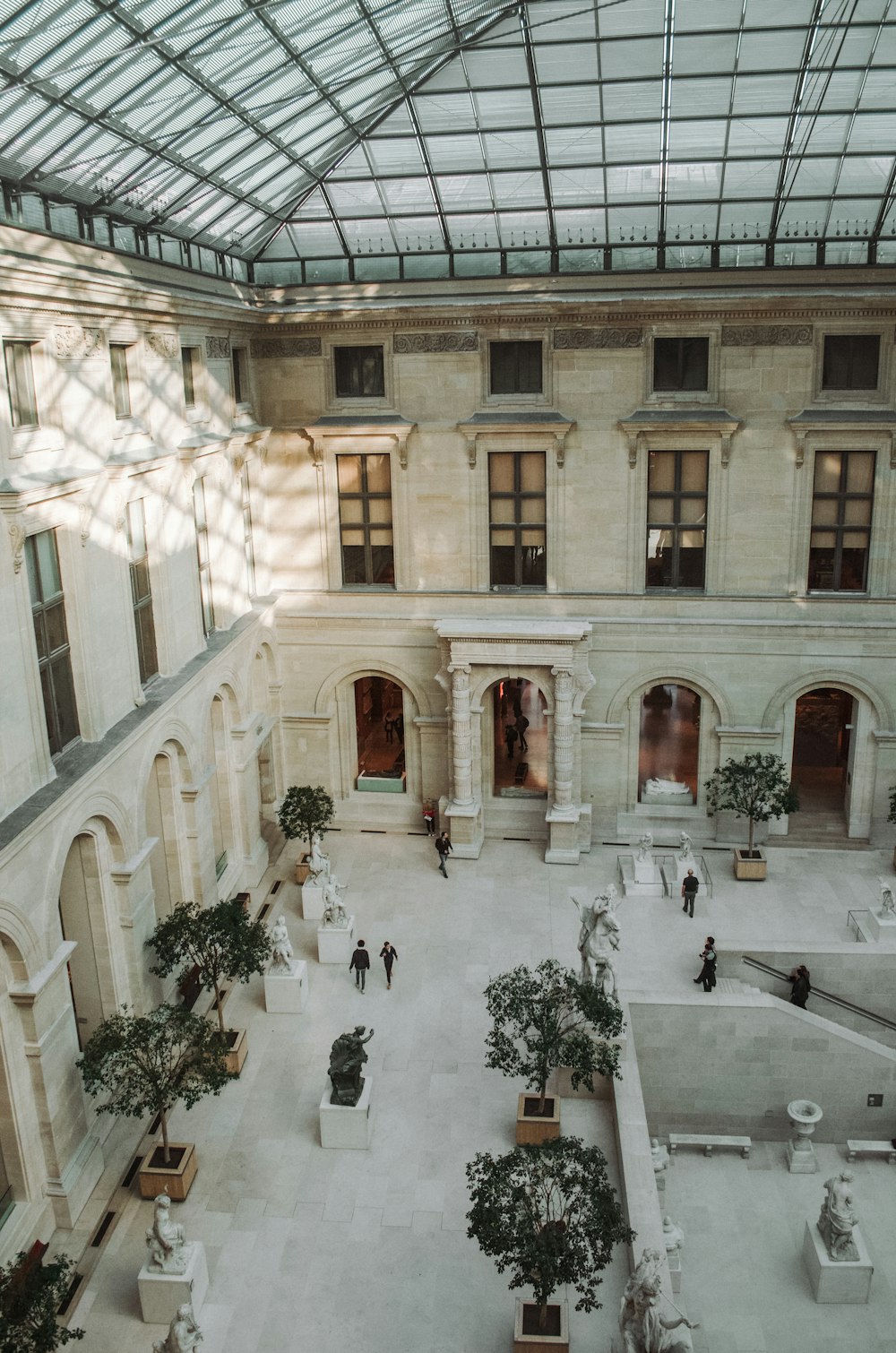 White Painted Concrete Building Photo Free Human Image On Unsplash