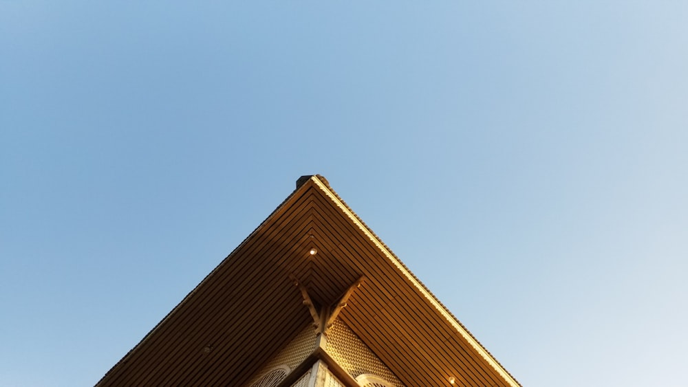 brown house in low angle photography during daytime