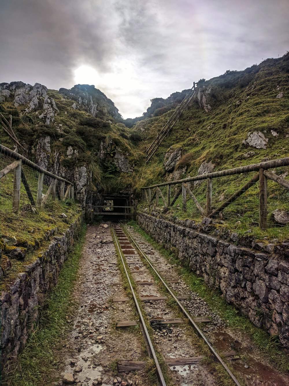 train railway under nimbus clouds