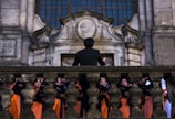 A choir singing together in a picturesque outdoor setting.