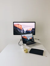 Minimalist workspace with a clean computer screen showing a task list.