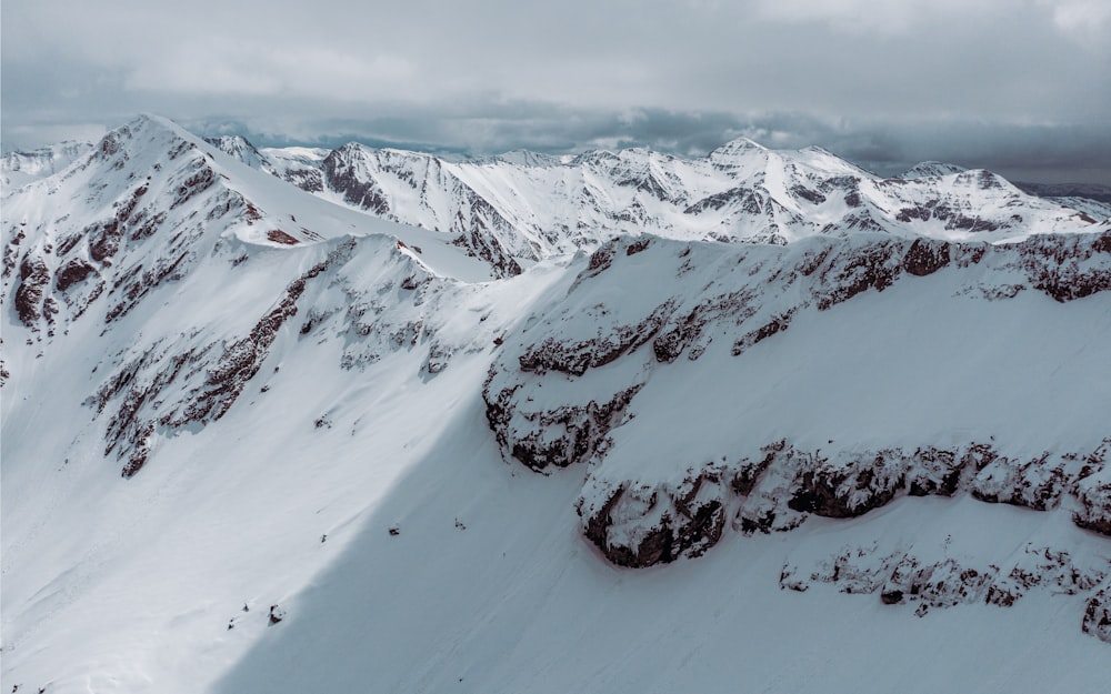 snow covered mountain during daytime