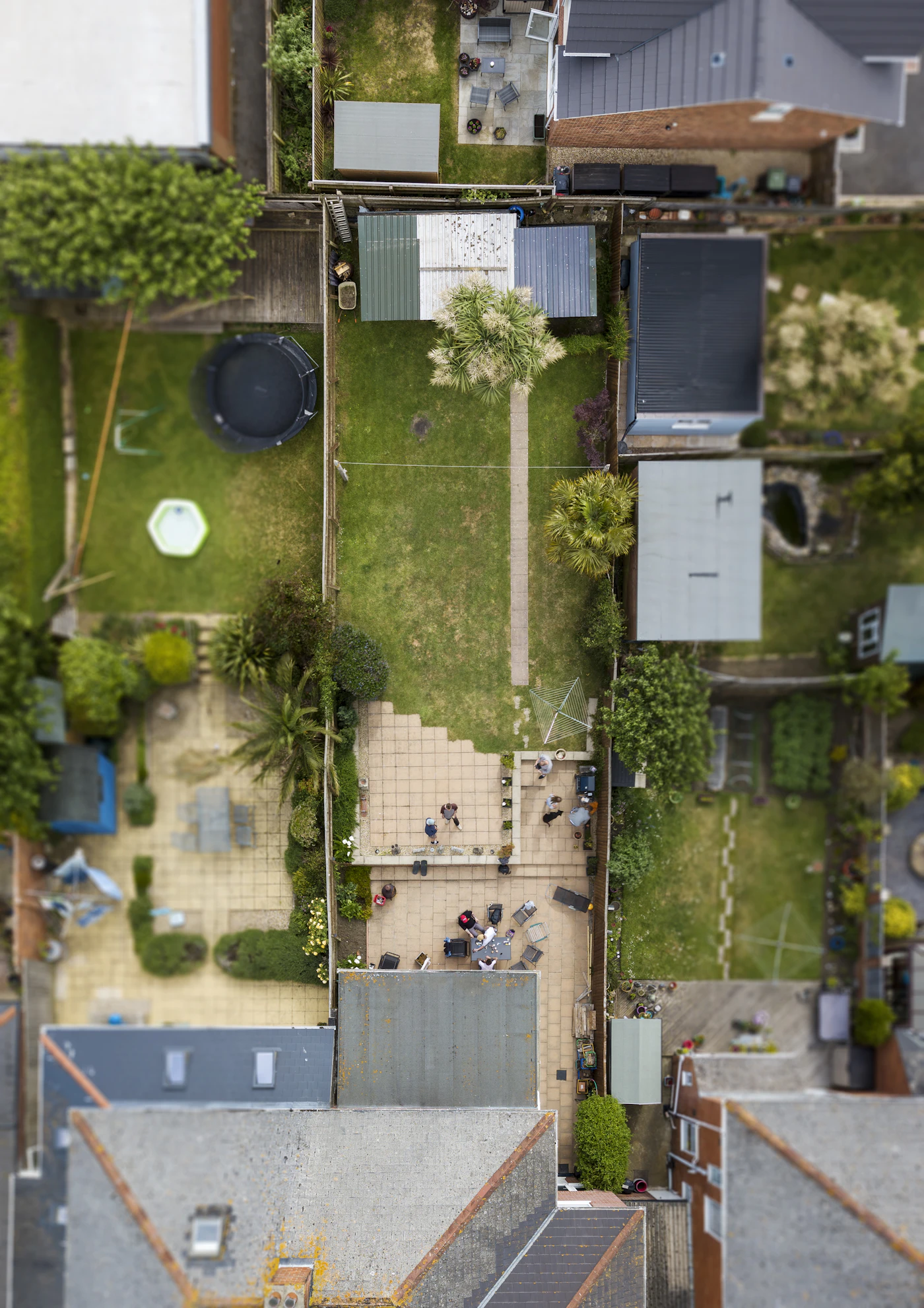 Top-down aerial view of a residential property and roof areas