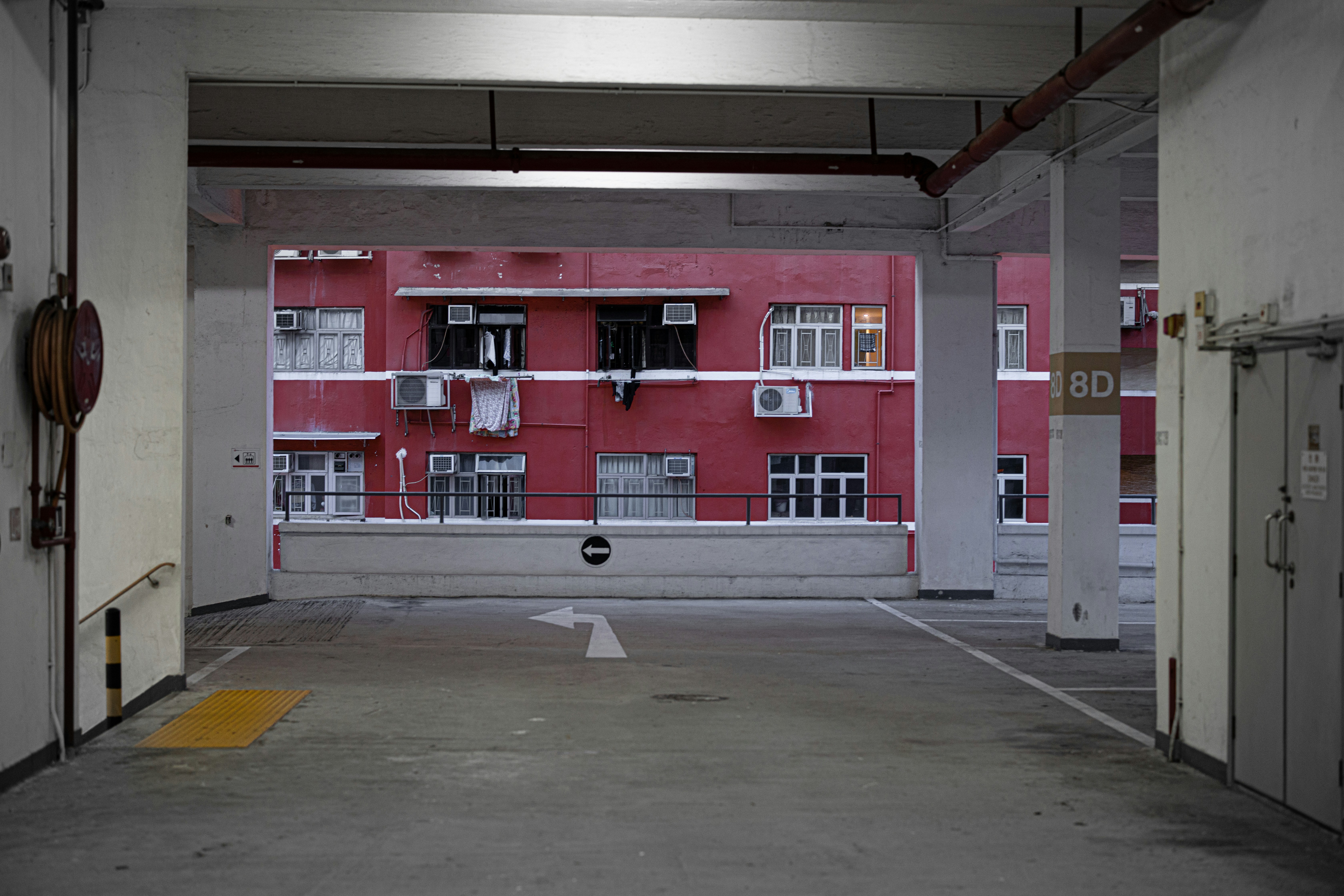 Urban parking garage exterior with city view