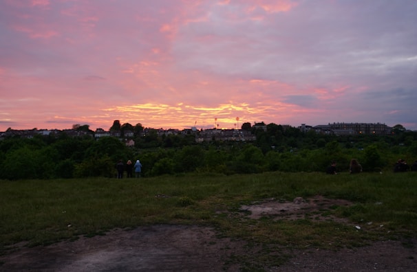 Sunset view over the Andes mountains with a small tour group admiring the scenery.