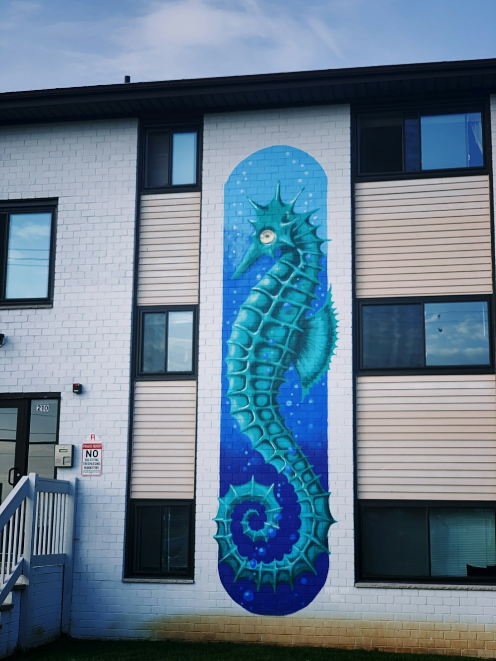 teal sea horse building paint