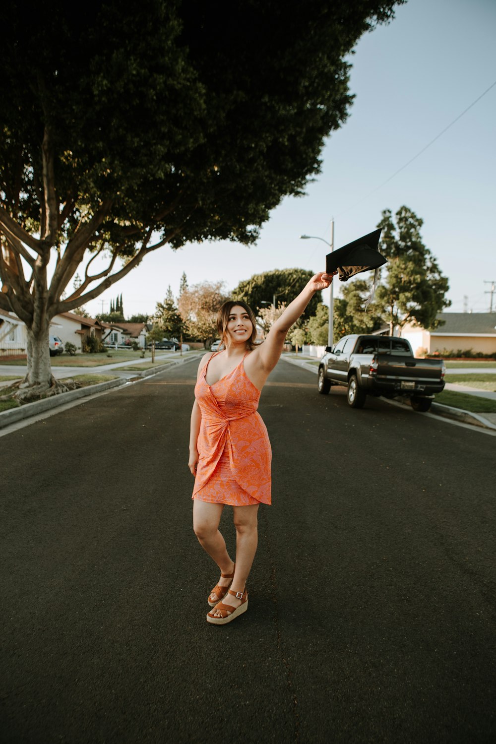 woman standing on road during daytime