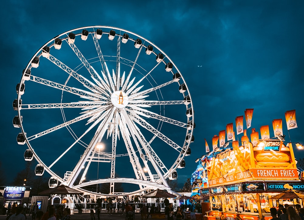 white ferris wheel with lights