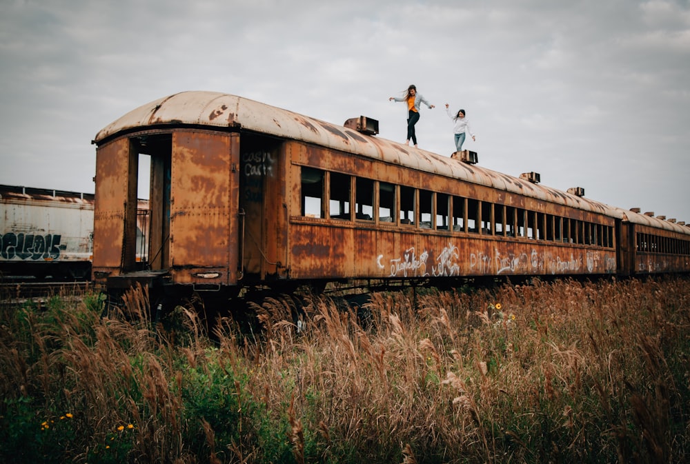 two women walking oon train