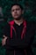 man wearing red and black pullover hoodie