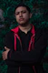 man wearing red and black pullover hoodie