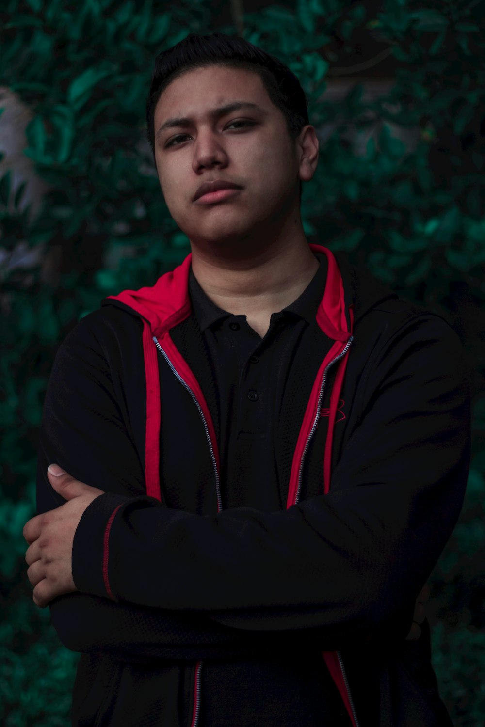 man wearing red and black pullover hoodie