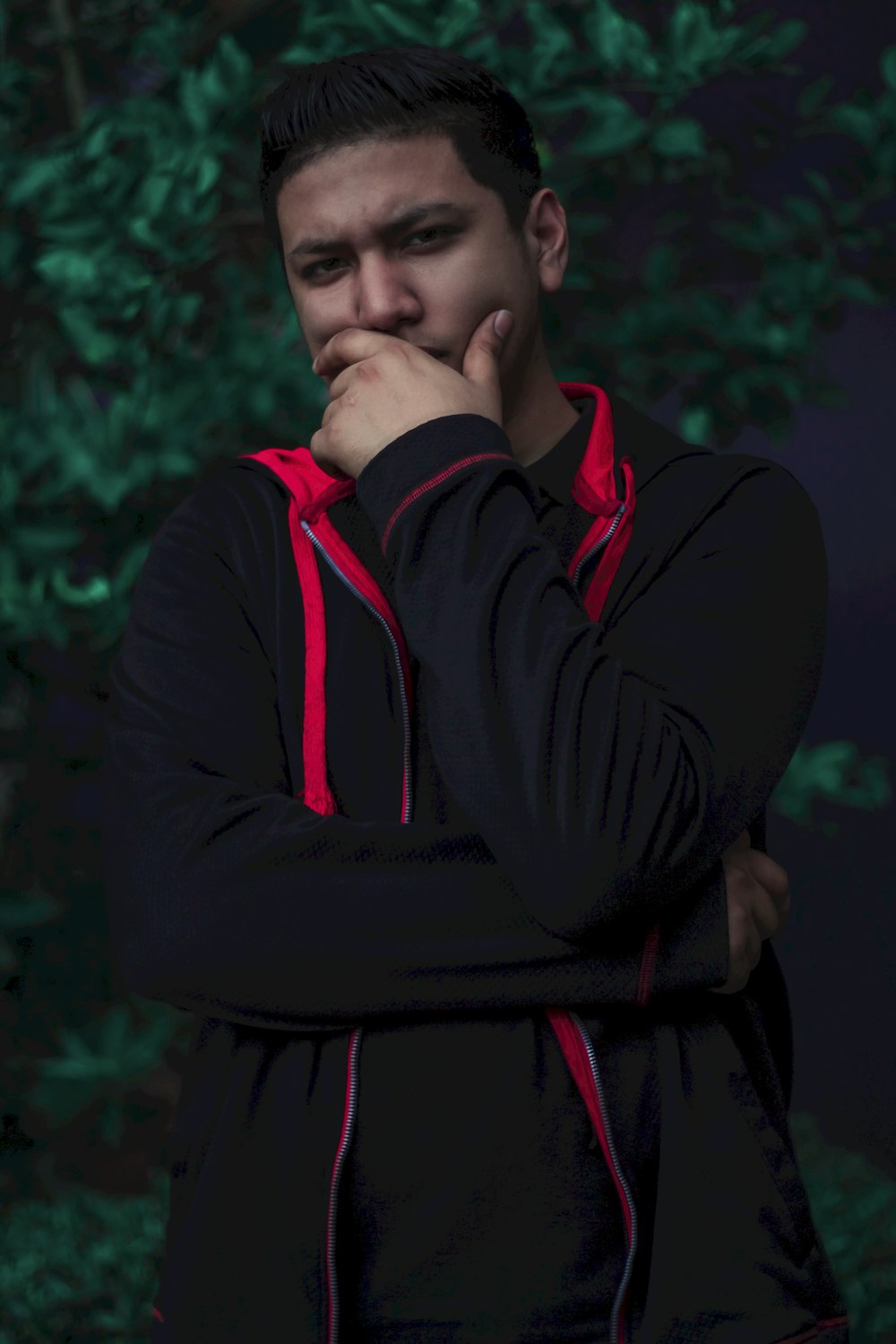 man wearing red and black jacket