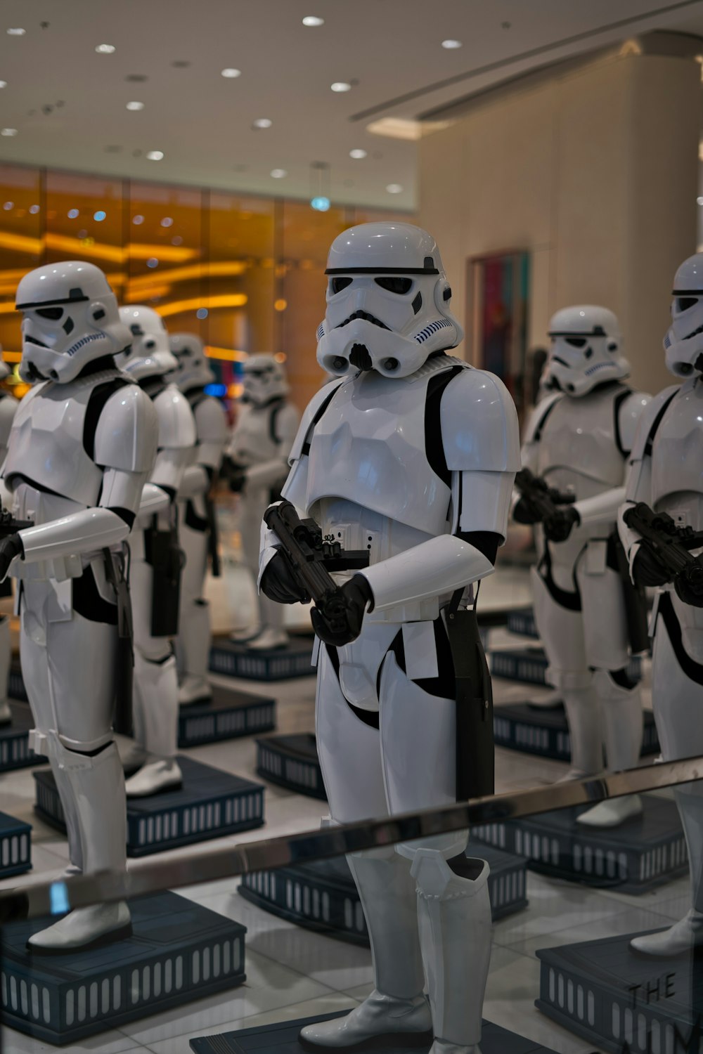 selective focus photography of Stormtrooper statues