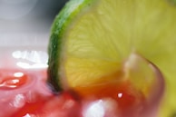 A close-up of a lime slice with artistic effects.