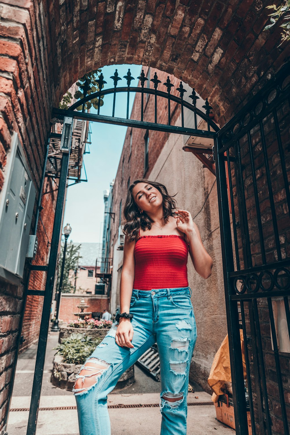 woman wearing red camisole