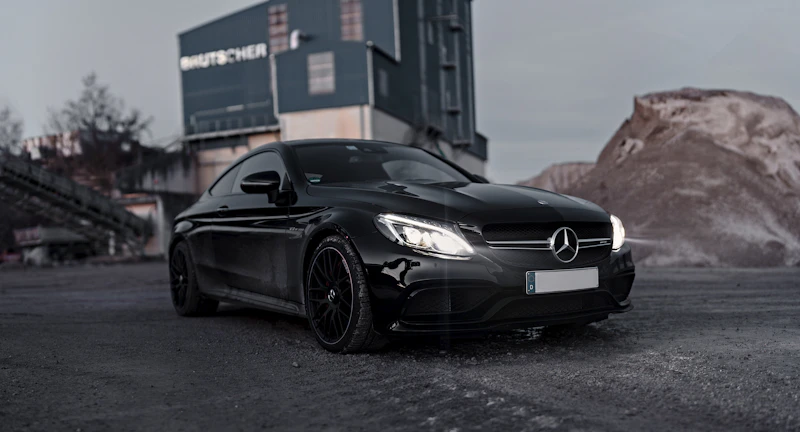 Professional black Mercedes luxury sedan ready for Santorini private chauffeur service