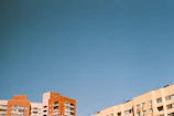 Street view of new residential buildings in Pueblo Libre with clear blue sky