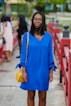 woman in blue long sleeved mini dress