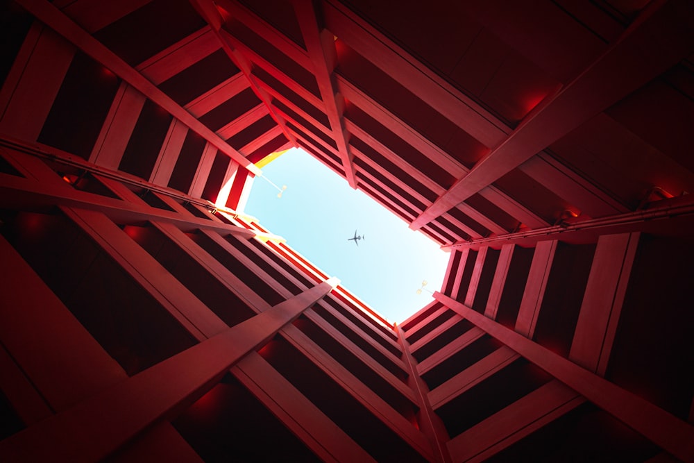 low angle photo of black and red concrete building