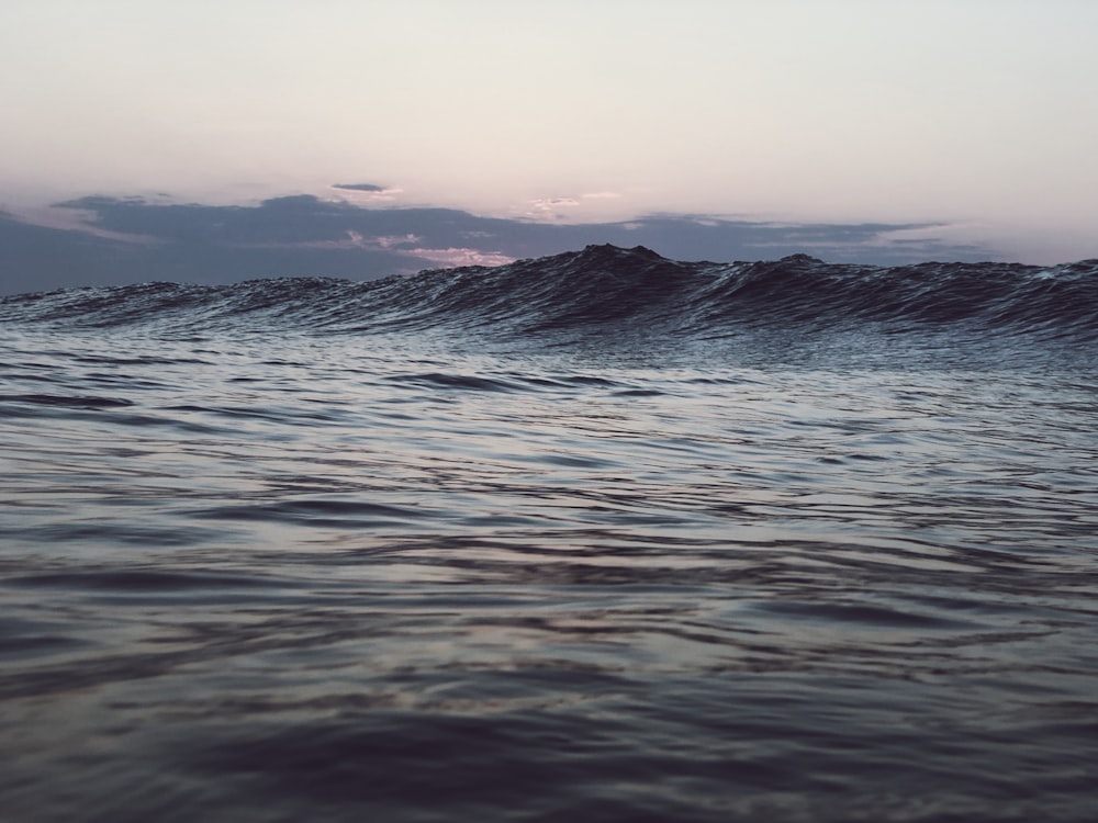 sea wave during sunset