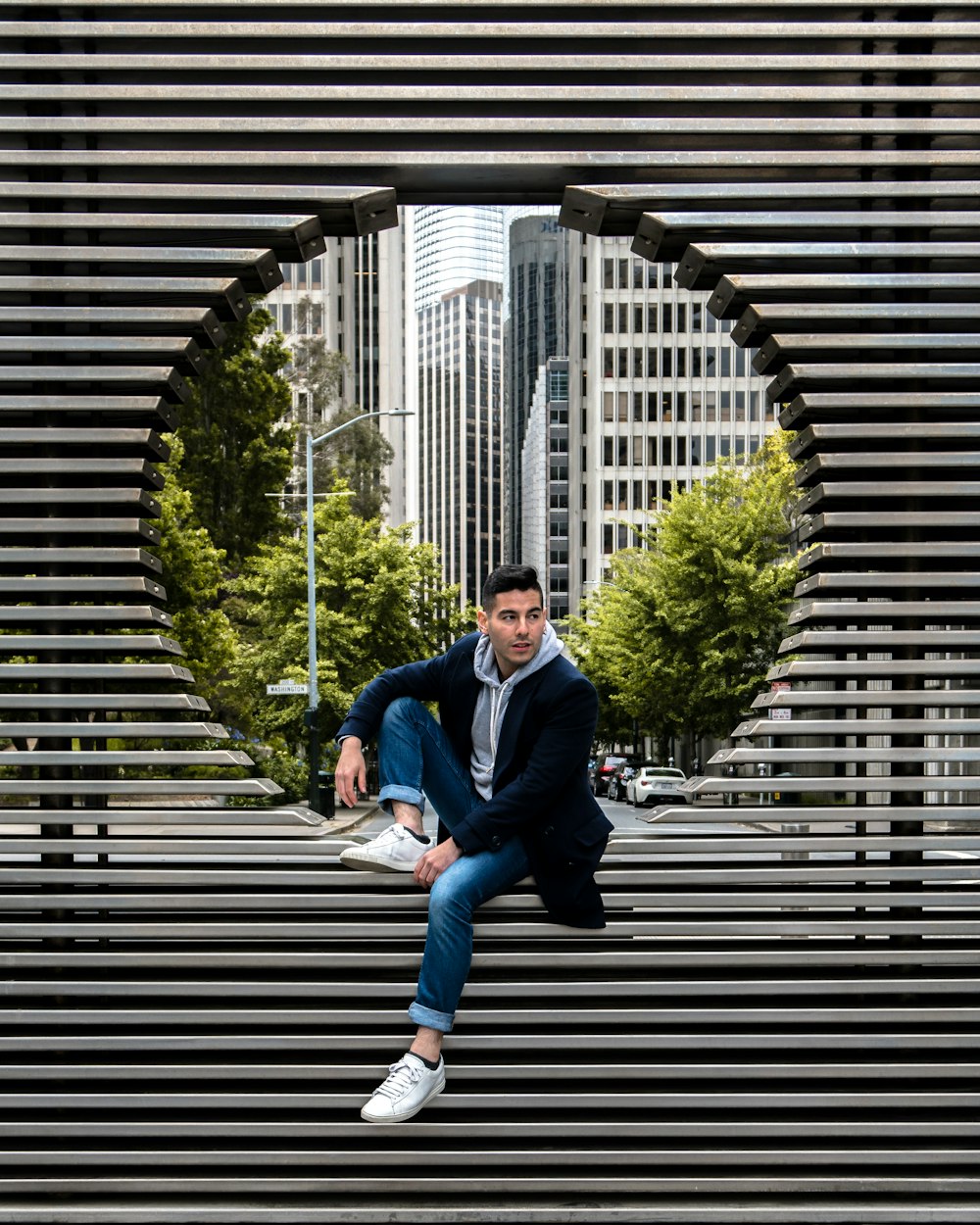 man sitting on structure