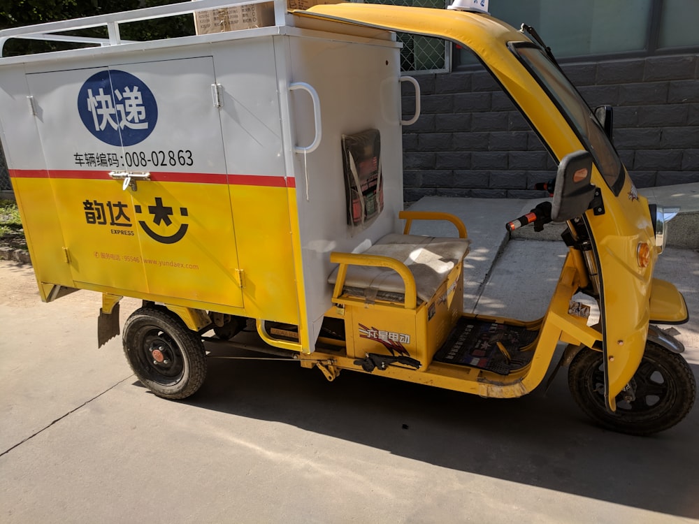 yellow auto rickshaw