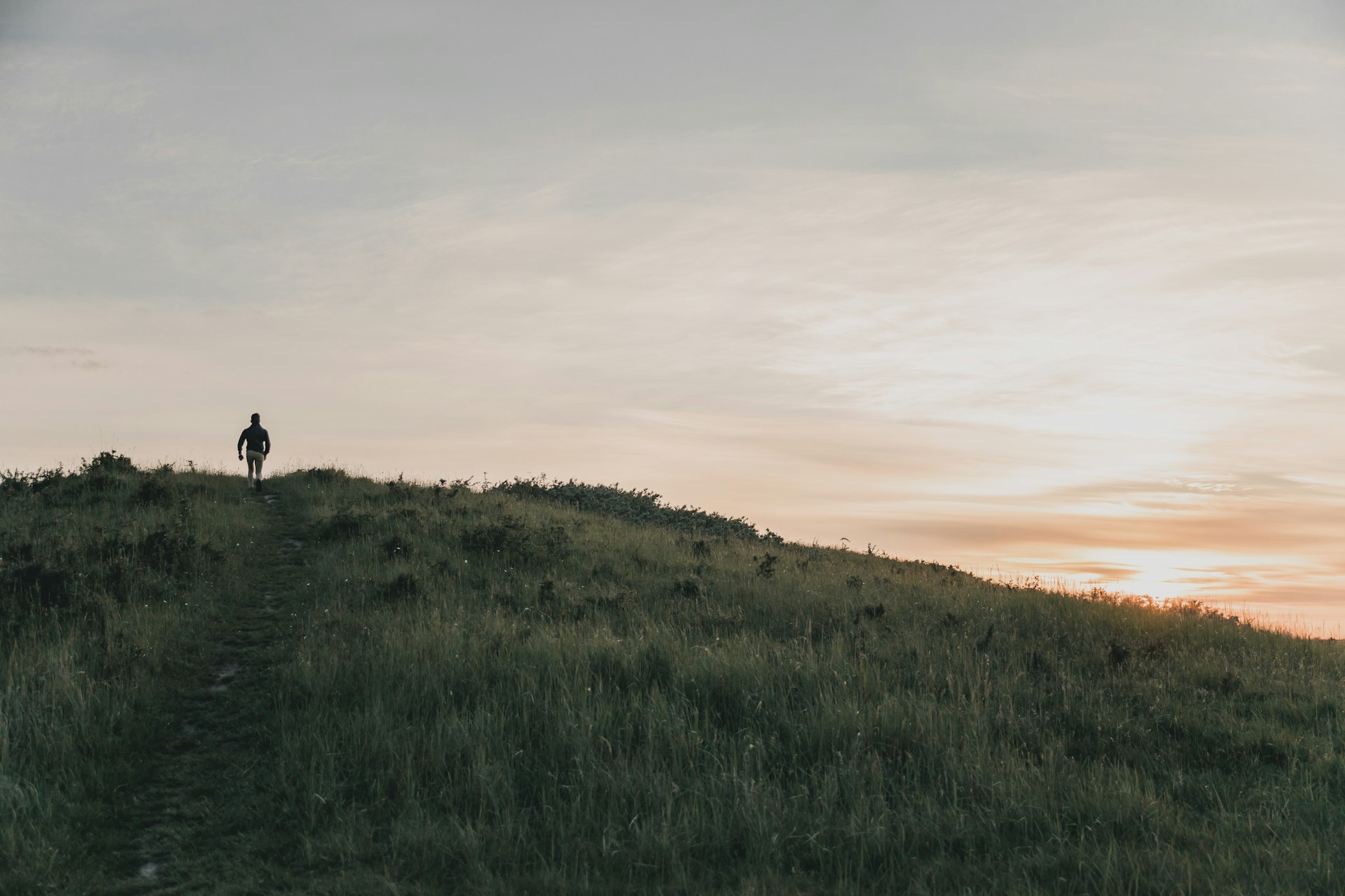 person on top of mountain